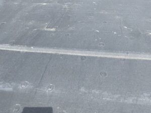 worn membrane on commercial roof